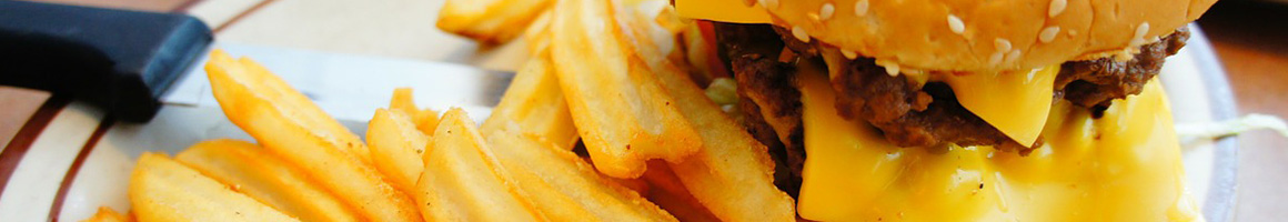 Eating Burger at Art's Burgers restaurant in El Monte, CA.